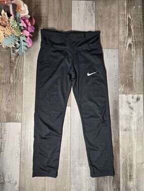 Nike Dri-Fit Women's Black Athletic Leggings with Swoosh Logo in Silver Size XS